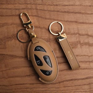 Funda de cuero para llavero Hyundai, hecha a mano en caja de regalo, llavero para Hyundai Santafe Tucson.
