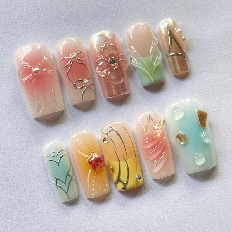pastel nails, soft aesthetic, elegant nails, bow nails, butterfly nails, flower nails set, spring pressons, korean nails, cute pastel set, handmade nails, natural press ons, simple classy set, custom nail art