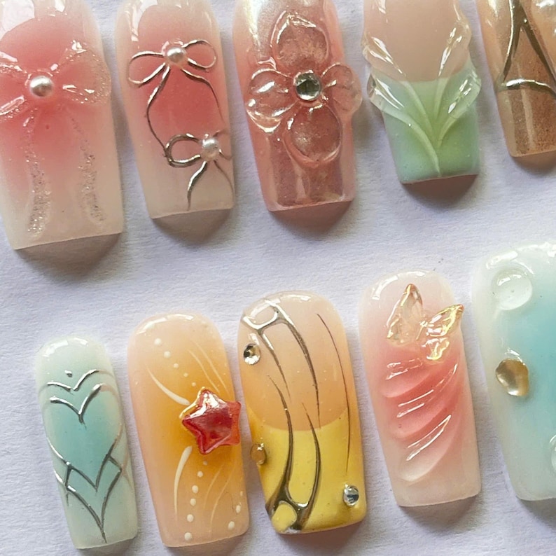 pastel nails, soft aesthetic, elegant nails, bow nails, butterfly nails, flower nails set, spring pressons, korean nails, cute pastel set, handmade nails, natural press ons, simple classy set, custom nail art