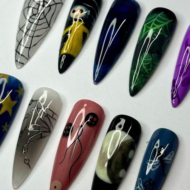 Coraline press on, Gothic nail art, Spooky press nails, Creepy cute nails, Halloween fake nails, Handmade false nails, Horror nail design, Dark aesthetic nails, Unique press on set, Witchy nail art, Long stiletto nails, Movie inspired nails, Alternative nails, Custom nail design, Holiday nails, Party nails