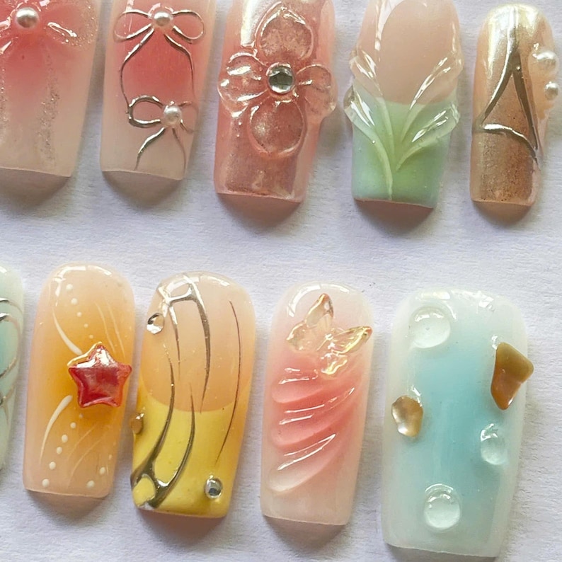 pastel nails, soft aesthetic, elegant nails, bow nails, butterfly nails, flower nails set, spring pressons, korean nails, cute pastel set, handmade nails, natural press ons, simple classy set, custom nail art