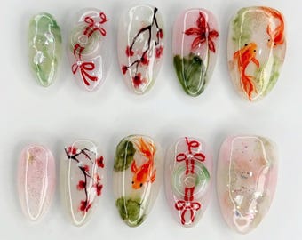 Ongles à presser sur le thème asiatique, ensemble d'ongles en amande vives, ongles de poisson, ongles de fleurs, presser 3D, presser à la main, presser sur les ongles de printemps.