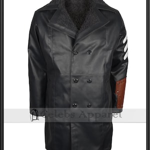 May include: Black double-breasted coat with a faux fur collar. The coat has a brown leather patch on the right sleeve and white stripes. The coat features a button closure and is made of a leather-like material. The text "Celebs Apparel" is visible.