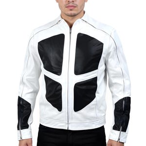 May include: A white leather jacket with black geometric panels on the chest and sleeves. The jacket has a zip-up front, a stand-up collar, and zippered cuffs. The design is modern and stylish, suitable for various occasions.
