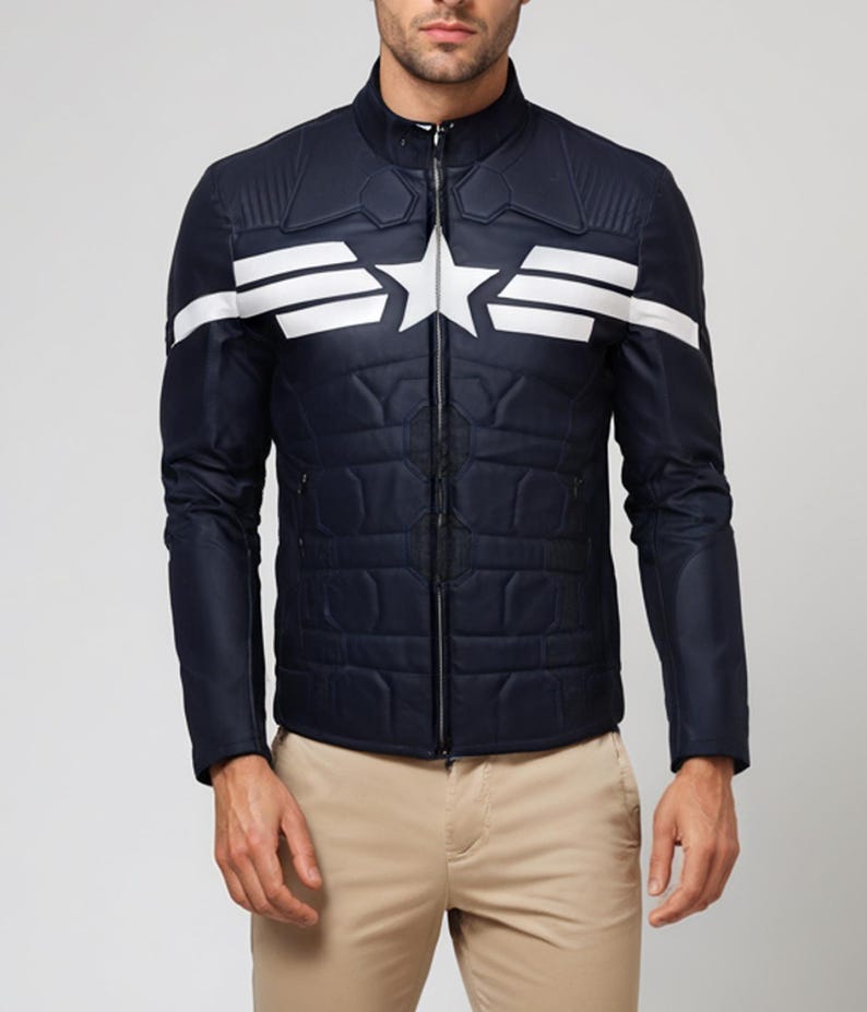 May include: Navy blue quilted jacket with a white star and stripe design on the chest. The jacket has a stand-up collar and a full-length zipper. The sleeves are long and the jacket is paired with khaki pants.