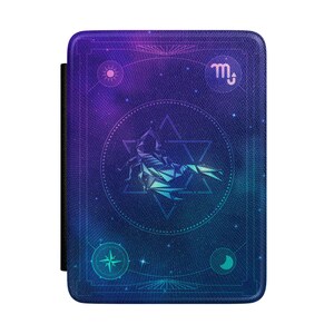 May include: A rectangular, dark blue case with a celestial design. The case features a scorpion illustration within a star-shaped frame, surrounded by astrological symbols. The background has a gradient of purple and blue, with a black elastic band on the left side.