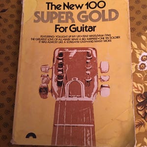 The New 100 Super Gold for Guitar