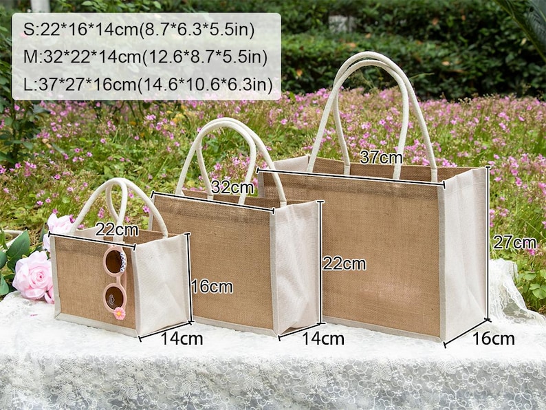 May include: Three rectangular jute tote bags with white fabric trim and handles. Sizes are S: 8.7x6.3x5.5 inches, M: 12.6x8.7x5.5 inches, and L: 14.6x10.6x6.3 inches. The smallest bag features a pair of pink-rimmed sunglasses hanging from one handle.