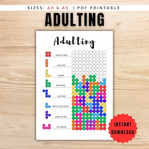 May include: A white printable chart with the word "ADULTING" at the top. The chart has sections for tracking daily tasks like cooking, paying bills, and exercising. The chart is filled with colorful dots, and includes the text "INSTANT DOWNLOAD".