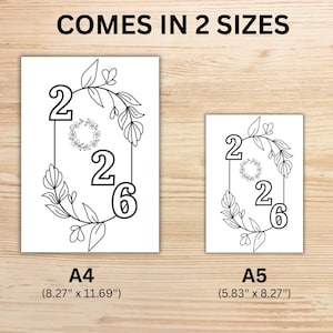 May include: Two white prints with the numbers "226" inside a floral frame. The prints are labeled A4 (21 cm x 29.7 cm) and A5 (14.8 cm x 21 cm). The text "COMES IN 2 SIZES" is at the top.