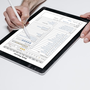 May include: A black tablet displaying a daily planner template with sections for tasks, weather, and energy levels. A white stylus is used to interact with the digital planner. The text "Daily Planner" is visible.