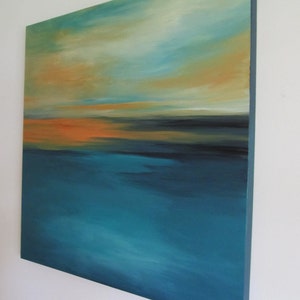 May include: Abstract painting on canvas with a blue, green, and orange color scheme. The painting depicts a seascape with a horizon line and clouds in the sky.