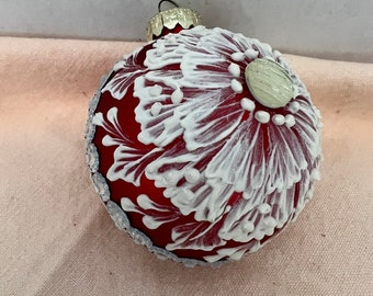 Red Christmas ornament,2.6” in size, glass,rhinestones around sides,rhinestone cross,white raised mud