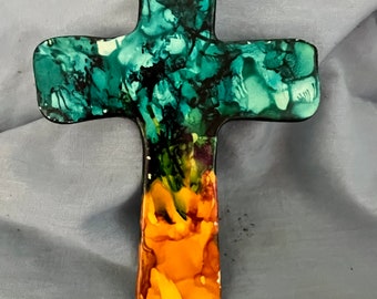 Hand made cross out of clay, alcohol ink added green and honey comb, and then sealed with a clear spray glaze, hanger added, 5 1/2” by 4”