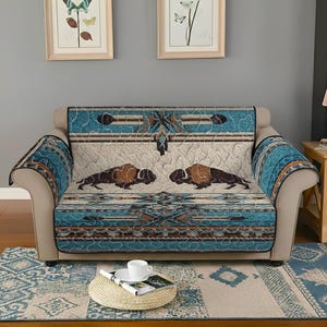 May include: A white ceramic mug with a black handle and the text "But First, Coffee" in a black, bold font. The mug is on a white surface.