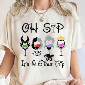 May include: A white ceramic mug with a black handle and the text "But First, Coffee" in a black, bold font. The mug is sitting on a wooden surface. The mug is approximately 4 inches tall.