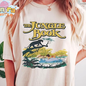 Disney The Jungle Book Mowgli Baloo Bagheera Comic Shirt, Magic Kingdom Collection, Perfect for Disney Fans, Classic Character Design.