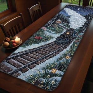 May include: A quilted table runner depicting a winter train scene. The design features a black steam engine on tracks, a snowy landscape, and a night sky with a crescent moon. The runner is bordered with a dark fabric and has a quilted pattern.