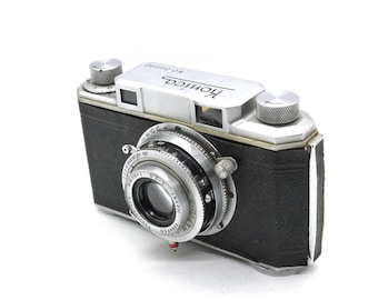 Konica I (Type C) 35 mm meetzoekercamera met 50 mm F2.8 lens, getest en werkend