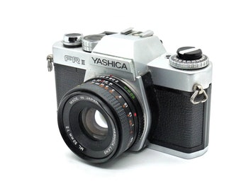 Yashica FRII 35mm SLR camera with 50mm F2 lens, tested and working