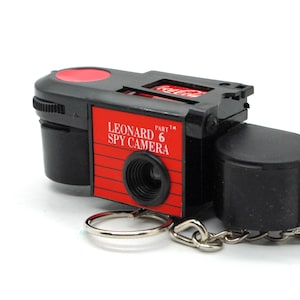 Coca Cola Leonard 6 Spy camera with 25mm F8 lens, tested and working