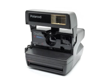 Polaroid 600 One Step Close Up instant camera with 116mm F11 lens, tested and working