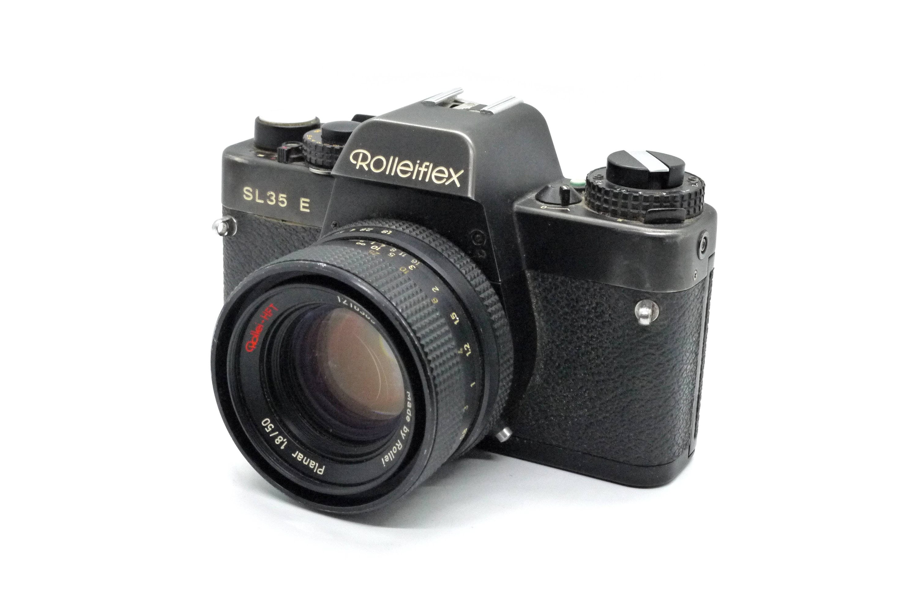 Rolleiflex SL 35 E 35mm SLR camera with Carl Zeiss Planar 50mm F1.8 lens,  tested and working