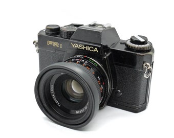 Yashica FRI 35mm SLR camera with 50mm F1.9 lens, tested and working