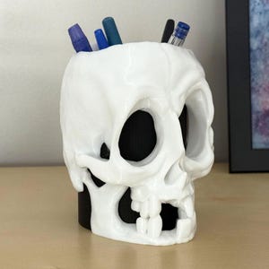 Cartoon Skull Pen Holder: Creepy-Cute Desk Organizer