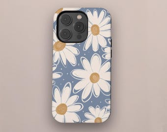 May include: A phone case featuring a daisy pattern. The case has a light blue background with white daisies and yellow centers. The design is repeated across the surface of the case.