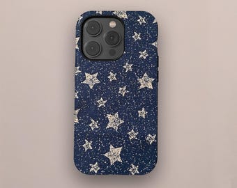 May include: A navy blue phone case with a pattern of white stars. The stars have a distressed, textured appearance, and are scattered across the case. The phone case has a camera module with three lenses.