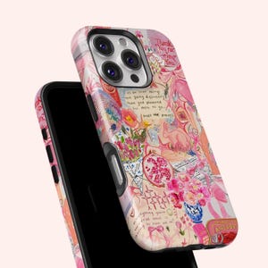 May include: A pink and white phone case with a colorful, artistic design. The case features a collage of flowers, text, and a rabbit illustration. Text includes "Thank you for being you" and "Trust the process."