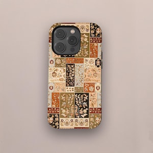 May include: A phone case with a patchwork design featuring floral and geometric patterns in shades of brown, green, and cream. The case has a camera cutout and a glossy finish.