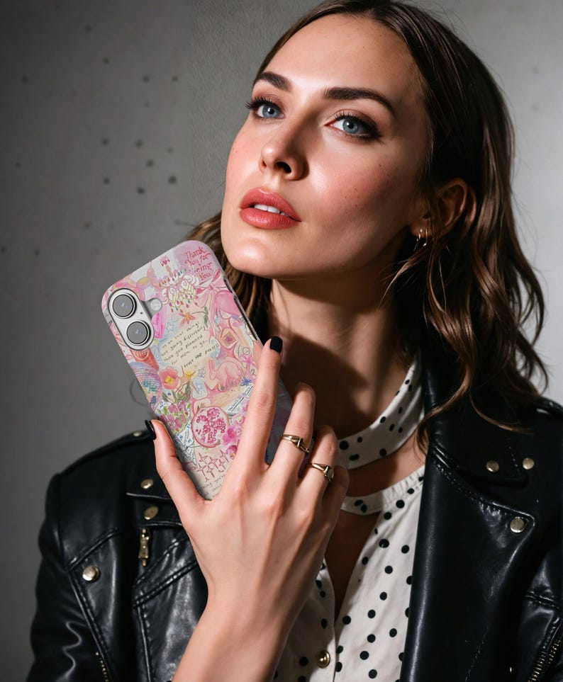 May include: A phone case with a colorful floral and script design. The case features pink, yellow, and blue hues with a vintage aesthetic. The text "Thank you for being you" is visible on the case.