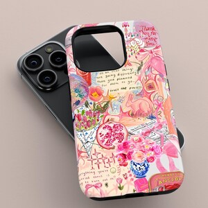 May include: A pink and white phone case with a colorful collage design. The case features illustrations of flowers, a rabbit, a disco ball, and text that reads "Thank You for being You" and "trust the process."
