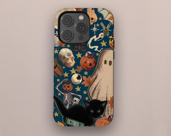 May include: A phone case with a Halloween-themed design. The case features a black cat, pumpkins, ghosts, skeletons, and other spooky elements on a dark blue background. The word "OCTOBER" is visible.