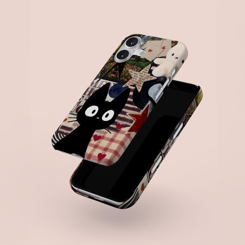May include: A phone case with a collage design featuring a black cat, red hearts, and a white stuffed animal. The case has a mix of patterns and textures, including plaid and star shapes. The word "vision" is visible on the case.