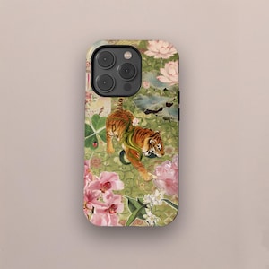 May include: A phone case with a tiger illustration and a green snake, set against a floral background with pink and white flowers. The case has a glossy finish and a camera cutout.