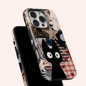 May include: A phone case featuring a collage design with a black cat illustration, a teddy bear, and vinyl records. The case has a cream background with red hearts and a plaid pattern. The phone case is designed to fit a smartphone.