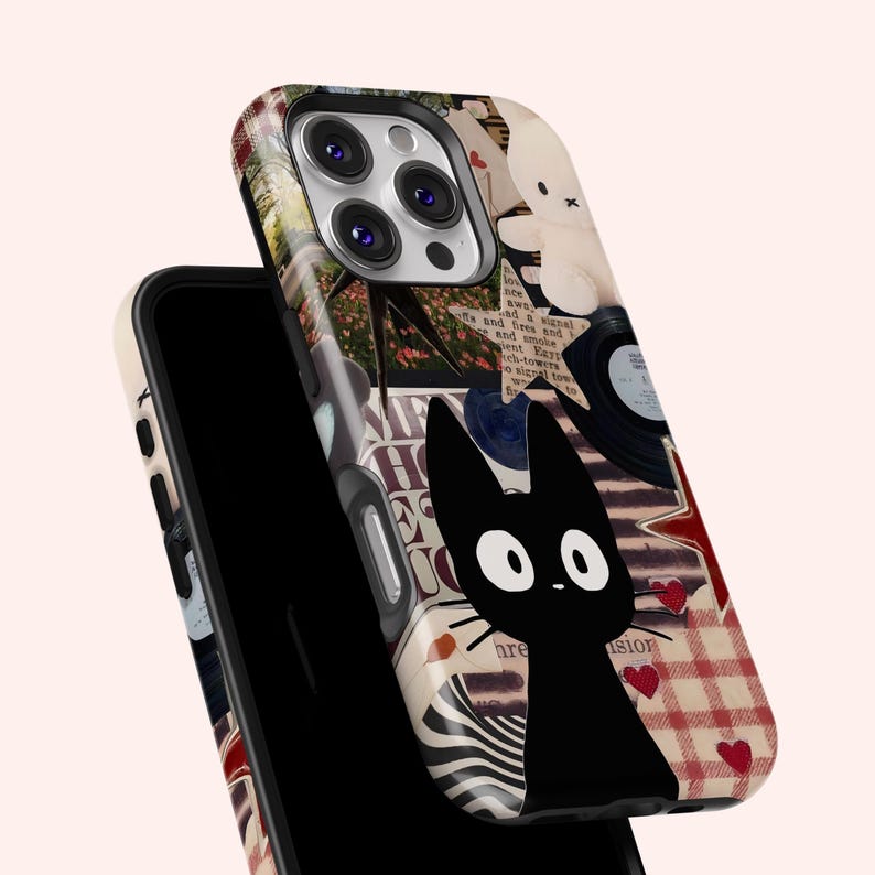 May include: A phone case featuring a collage design with a black cat illustration, a teddy bear, and vinyl records. The case has a cream background with red hearts and a plaid pattern. The phone case is designed to fit a smartphone.