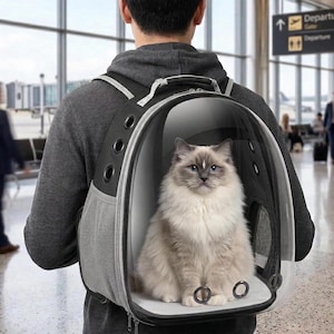 Mochila transportadora para gatos con forma de cápsula espacial, aprobada por aerolíneas, con ventana tipo burbuja.