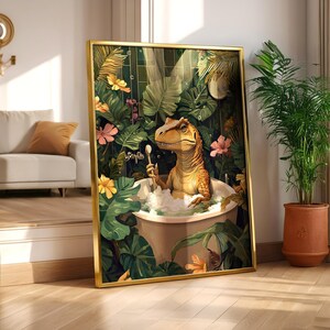 May include: A framed art print featuring a dinosaur in a bathtub, surrounded by lush green foliage and pink and yellow flowers. The dinosaur is holding a toothbrush. The artwork has a gold frame and is leaning against a wall.