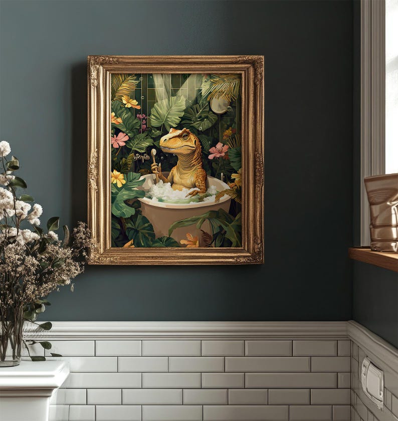 May include: A framed art print depicts a dinosaur relaxing in a bathtub filled with bubbles. The artwork features a gold frame and a lush, tropical background with vibrant flowers and foliage. The dinosaur is holding a toothbrush.