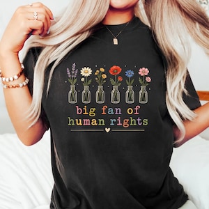 Camiseta unisex minimalista, gran defensor de los derechos humanos. Ningún ser humano es ilegal. Radicalizado por la decencia básica. Hagamos que Estados Unidos vuelva a ser amable. Practiquemos la empatía.