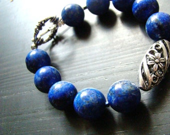Pulsera de cuentas de lapislázuli: cuentas florales de plata tibetana, joyería con piedras preciosas