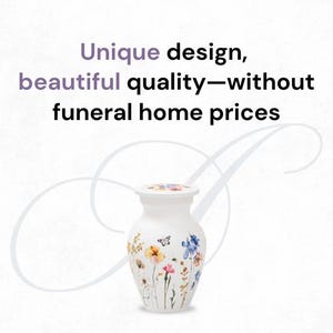 May include: White ceramic cremation urn with a floral design featuring butterflies and wildflowers.  Unique design, beautiful quality - without funeral home prices.
