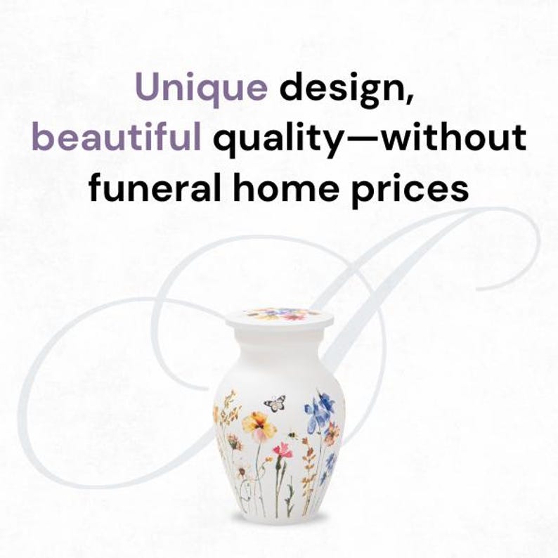 May include: White ceramic cremation urn with a floral design featuring butterflies and wildflowers.  Unique design, beautiful quality - without funeral home prices.