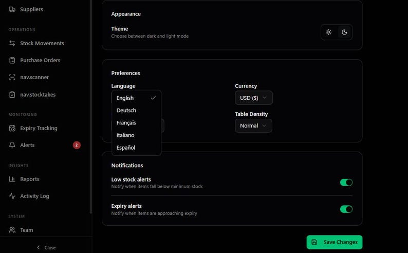 May include: A dark-themed interface with options for appearance, preferences, and notifications. The language selection menu is open, showing English, Deutsch, Fran&ccedil;ais, Italiano, and Espa&ntilde;ol. Currency is set to USD, and table density is normal.