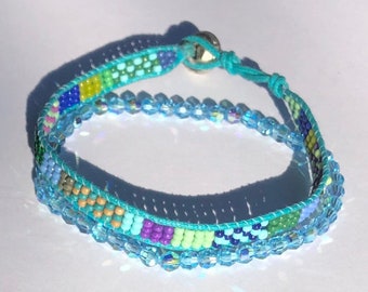 Quality Austrian crystals- aqua ABset w/ fair trade blue/aqua beaded bracelet