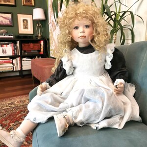 Clara Positively haunted spirit doll for bringing warmth, joy, and lightness into the home.